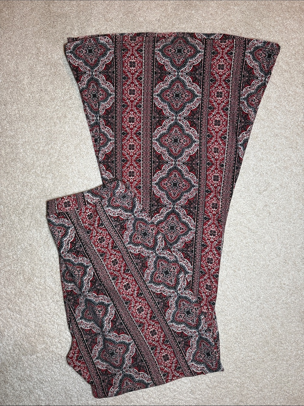 EARTHBOUND Red & Black Patterned Flare Pants